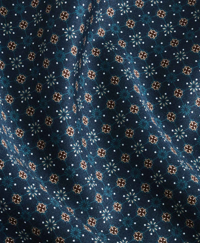 A close-up showcases the David Donahue Micro Print Sport Shirt CBSM11209, featuring a dark blue fabric with navy micro geometric print, white and brown star shapes, and light blue accents.