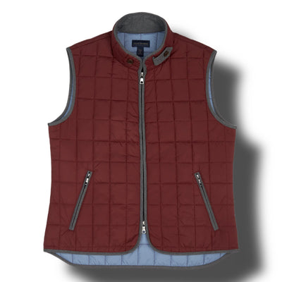 The Scott Barber Quilted Vest in Army (size X-Large) features gray trim, a zipper closure, and two zippered pockets. Laid flat on a white background, this lightweight vest combines style and comfort for all seasons.
