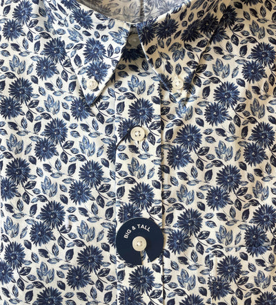Close-up of the Batton Dorian Big & Tall Long Sleeve Sport Shirt by Batton, featuring a blue floral pattern on cream and a circular "BIG & TALL" tag.