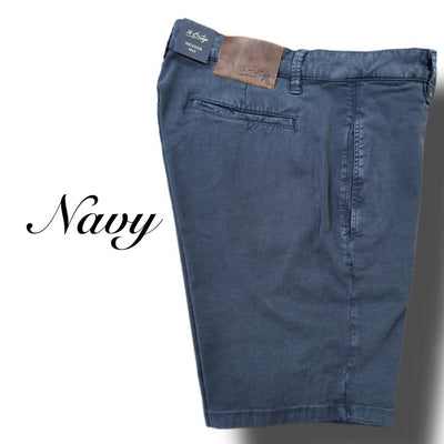 34 Heritage Nevada Soft Touch Shorts by 34 Heritage in navy blue, featuring a comfort rise, leather patch on the waistband, and Soft Touch fabric. Shown on a white background with "Navy" beside them.