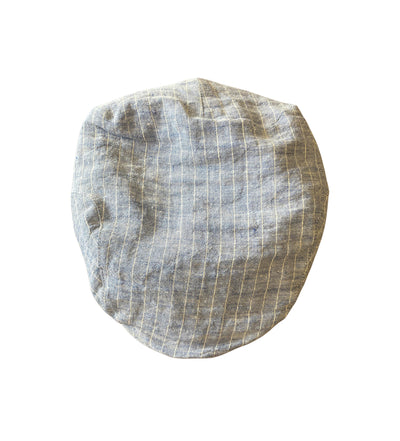 The Wigens Linen Ivy Cap 90483 by Wigens features a gray design with thin white vertical stripes, a short curved peak, and a narrow shaped crown. Displayed on a white background.