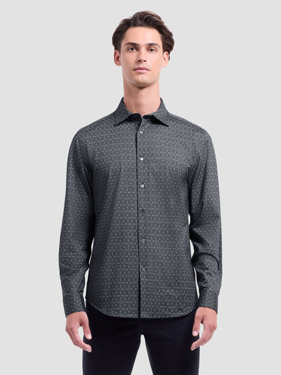 A person wearing a dark Bugatchi James Geometric Sport Shirt HF9027K60 stands against a plain light gray background.