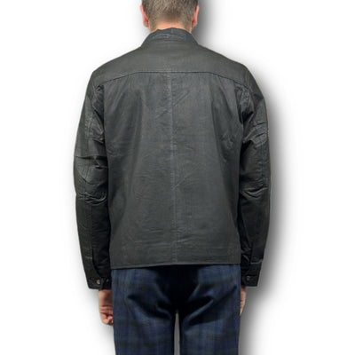 A person wearing the Missani Vintage Leather Jacket 392794 and blue plaid pants is shown from the back against a white background.