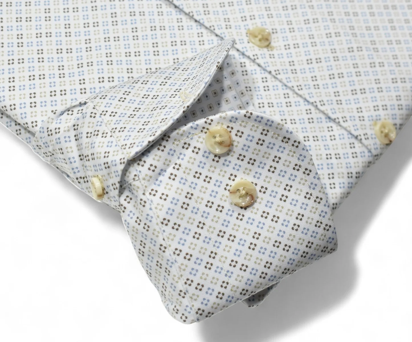 A close-up of the Marcello OP Colored Bracket Medallion Sport Shirt W104 sleeve, showing its geometric square pattern, cream buttons, and refined one-piece collar.