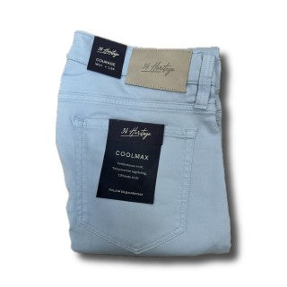 Folded 34 Heritage Courage Coolmax light blue jeans with brand tags, featuring CoolMax fabric for temperature regulation and a modern straight leg fit.