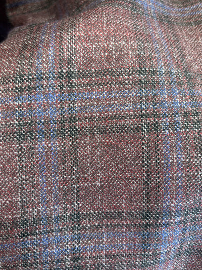Close-up of a Hart Schaffner Marx New York Burgundy Plaid Sport Coat 35H0128 in a burgundy, black, and blue wool-blend plaid fabric.