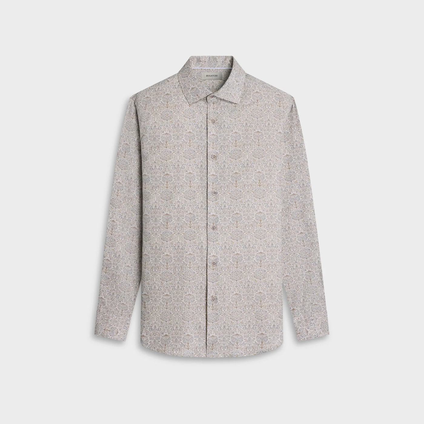 The Bugatchi Axel Paisley Sport Shirt (KS3132L40S) by Bugatchi is a long-sleeve button-up Italian cotton shirt featuring a subtle beige and white paisley floral print, displayed against a plain white background.
