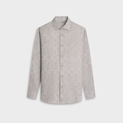 The Bugatchi Axel Paisley Sport Shirt (KS3132L40S) by Bugatchi is a long-sleeve button-up Italian cotton shirt featuring a subtle beige and white paisley floral print, displayed against a plain white background.