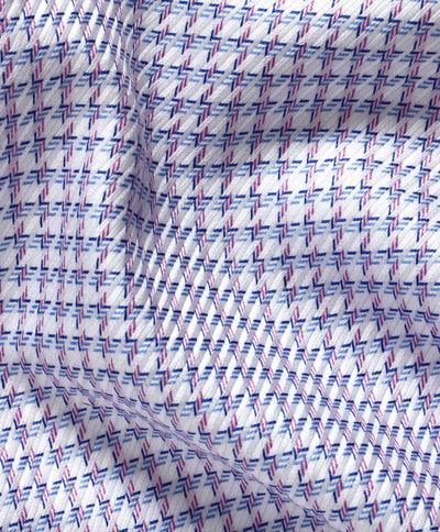 Close-up of David Donahue Chk TBSP10809464 dress shirt fabric by David Donahue, featuring light blue Pima cotton with small blue and red diagonal lines, highlighting the texture and folds.