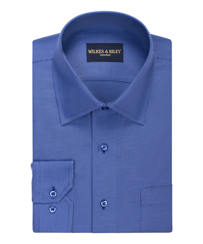 Folded blue Wilkes & Riley Queens Oxf Tailor dress shirt features a spread collar, small check pattern, buttoned cuffs, and soft Supima cotton for all-day comfort. "Wilkes & Riley Non Iron" label inside the collar.