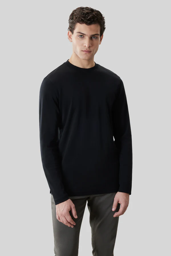 A man wearing a Robert Barakett High Crew Long Sleeve RB82247 and gray pants stands against a light gray background.
