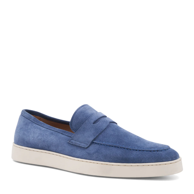 The Bruno Magli Prato Slip On Loafer features blue suede, a white rubber sole, a low heel, and a simple, elegant design.