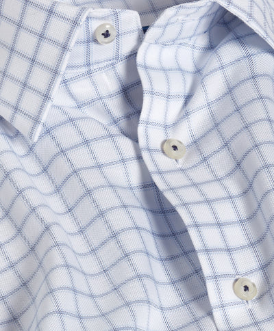 Close-up of the David Donahue Windowpane Check Dress Shirt TBSP13810, a men’s dress shirt by David Donahue, crafted from premium Pima cotton and featuring a white and navy windowpane pattern with classic white buttons.