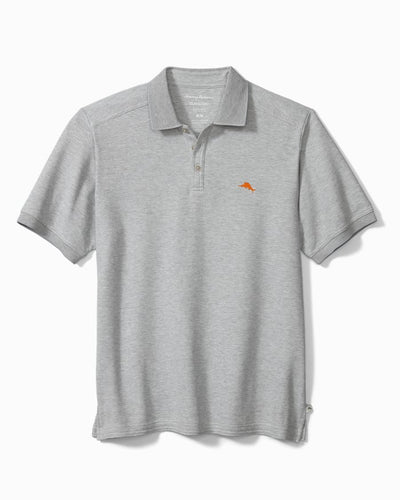 The Tommy Bahama Emfielder Polo Big & Tall is a light gray Supima cotton shirt with a collar, button placket, and a small orange embroidered logo on the left chest.