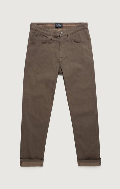 The 34 Heritage Courage Diagonal Pants by 34 Heritage are coffee-colored, straight fit jeans featuring button and zip closure, front and back pockets, and rolled-up cuffs, displayed flat on a white background.