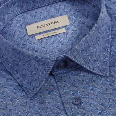 Close-up of the Bugatchi James Geometric Sport Shirt KF9188K60, a blue wrinkle-resistant shirt showcasing an abstract leaf pattern, button-down collar, and visible Bugatchi brand label.