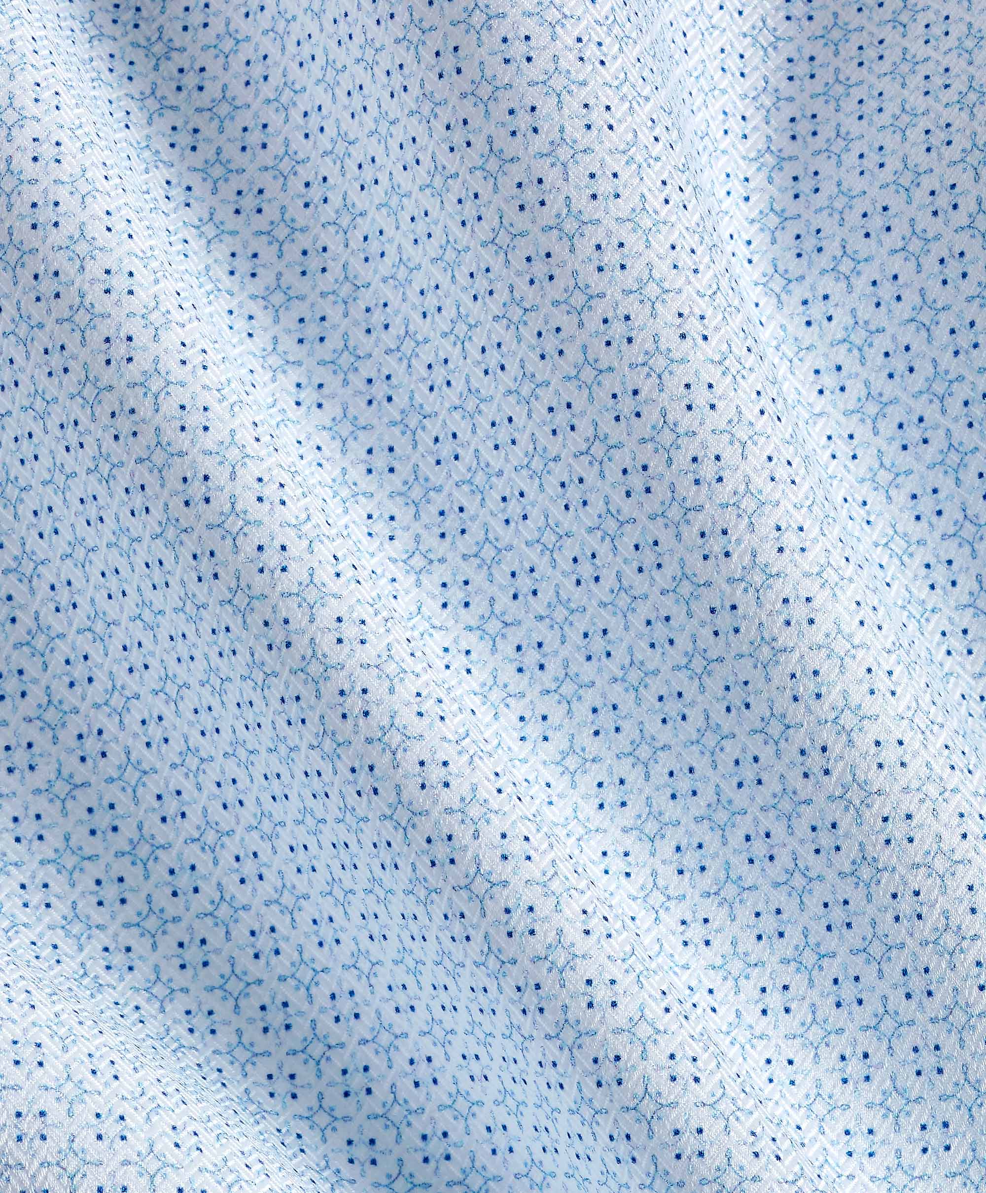 Close-up of the David Donahue OP Geo Dress Shirt TBSP12601136 fabric, featuring a light blue Pima cotton with a small repeating blue dot and line pattern, gentle folds, and a soft texture.