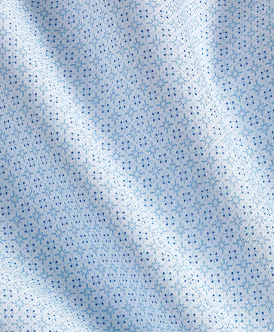 Close-up of the David Donahue OP Geo Dress Shirt TBSP12601136 fabric, featuring a light blue Pima cotton with a small repeating blue dot and line pattern, gentle folds, and a soft texture.