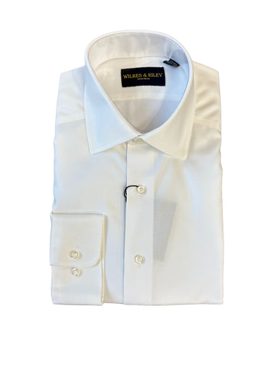 A folded Wilkes & Riley Ivory Spread Clr Shirt B1633, featuring a spread collar and buttoned cuffs, is displayed on a white background.