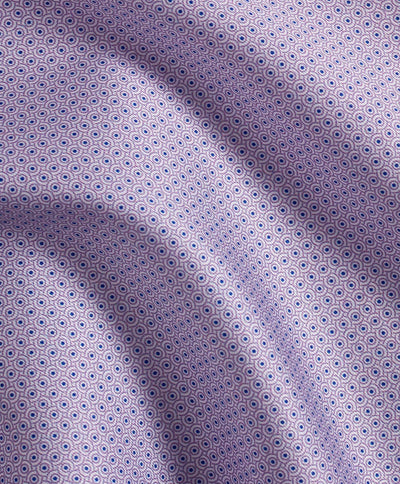 Close-up of David Donahue Geometric Dot Print Dress Shirt 10010 fabric, featuring a purple 100% cotton material with a repeating small circular pattern and soft folds—ideal for formal occasions.