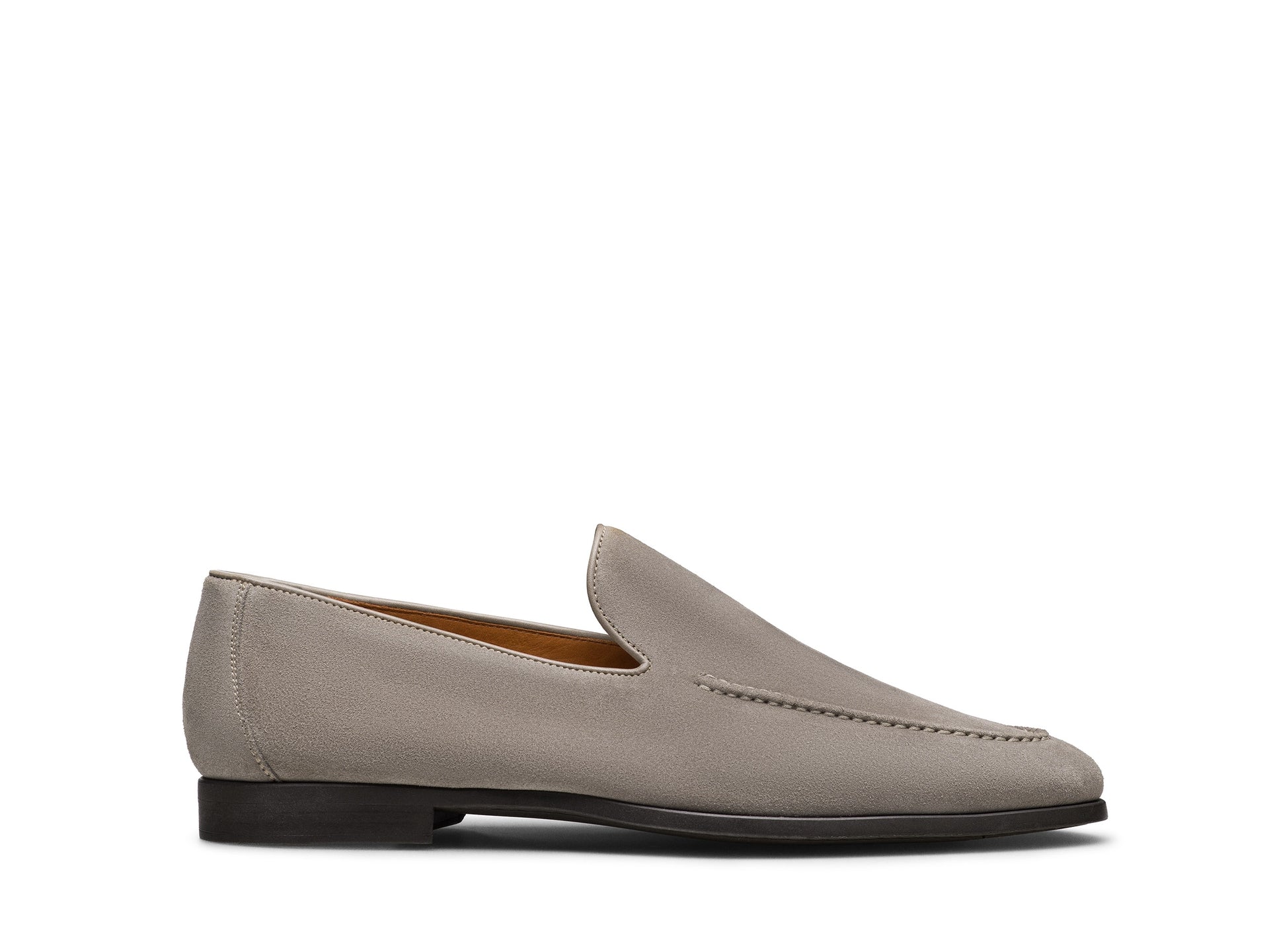 The Magnanni Lecera II Suede Loafer by Magnanni is shown in light gray suede with stitched detailing, a low black heel, and a slip-on design, displayed against a plain white background.