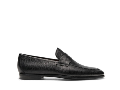 The Magnanni Diezma II by Magnanni is a black calfskin leather penny loafer with a textured finish, low heel, and rounded toe—displayed in profile against a white background as a stylish, comfortable dress shoe.