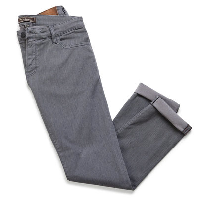 The 34 Heritage Charisma Diagonal Big&Tall by 34 Heritage features gray, relaxed straight leg trousers with one leg folded to reveal the inside cuff and waistband details.