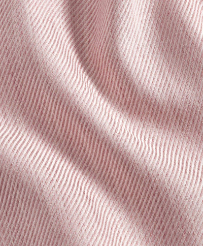 Close-up of the David Donahue Cashmere Blend Shirt CBSM11101, featuring pink and white stripes with gentle folds and a wavy texture that highlight the luxury men's sport shirt fabric.