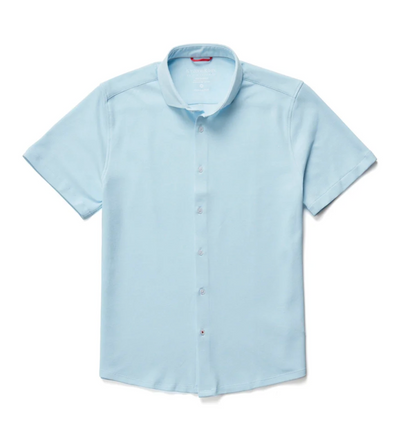 The Stone Rose SS Pique Shirt 2K7T241 by Stone Rose is a light blue short sleeve shirt laid flat on a white background, presenting a modern update to the classic men's performance shirt.