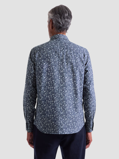 A man with gray hair is seen from the back wearing the Bugatchi Julian Woven Sport Shirt HS3051L3S, a long-sleeve stretch shirt by Bugatchi featuring a blue and white abstract pattern, set against a plain background.