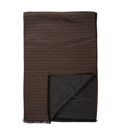 The Amanda Christensen Double Face Dot Scarf 440614 is a brown rectangular scarf with a subtle dark pattern and short fringe, partially folded to highlight its elegant reverse side.