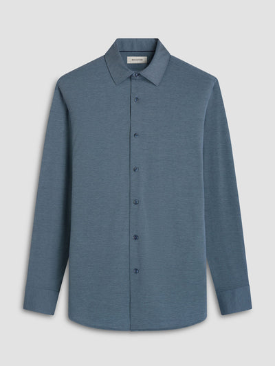 The Bugatchi James Long Sleeve Shirt HF9556K60 by Bugatchi features a classic collar, button-up front, and muted blue hue. Crafted from premium fabric, its simple design is showcased against a plain background.