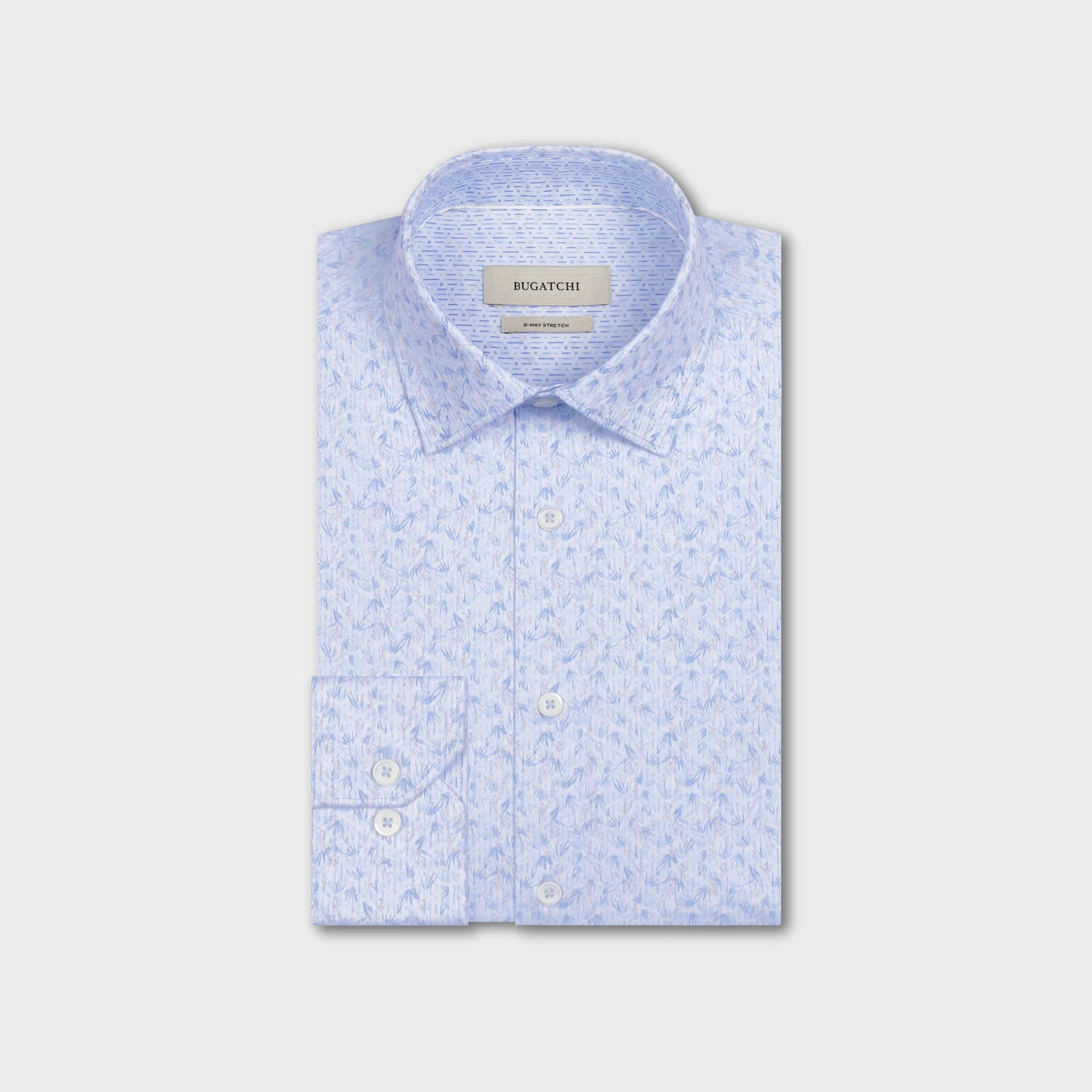 Folded light blue Bugatchi OP Jimmy OoohCotton® Shirt JF9648K61 featuring a subtle leaf pattern, button-down front, performance fabric, and visible Bugatchi label inside the collar.