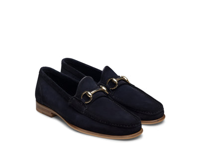 A pair of Magnanni Giancarlo Moc Toe Bit Loafers by Magnanni in black suede, featuring gold-tone horsebit detailing, hand-stitched accents, and light brown soles, displayed side by side on a white background.