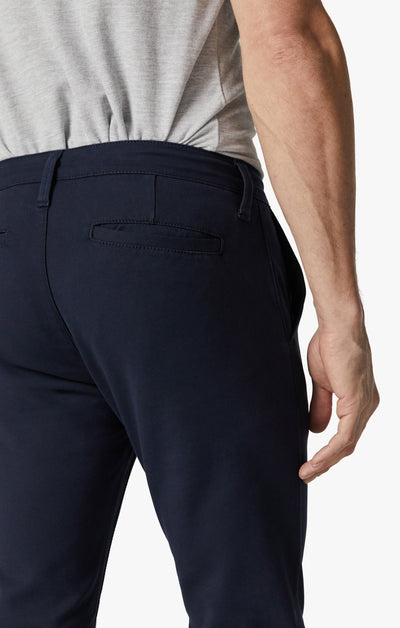 A person is shown from the waist down wearing the 34 Heritage Verona Pant High Flyer in light grey, with a focus on the back pocket area.