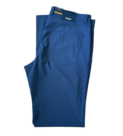 A pair of folded blue Alberto Ceramica Pipe 1351 pants by Alberto, featuring a visible back pocket, waistband tags, and crafted from comfortable stretch fabric.