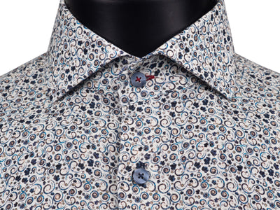 Close-up of a 7 Downie St. Multicolored Abstract Sport Shirt Big & Tall 26113 button-down featuring a multicolored abstract spiral and red medallion pattern on a light background.