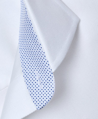 Close-up of the David Donahue Contrast Herringbone Solid Dress Shirt TBMS13100 collar with a blue dotted contrasting inner lining.