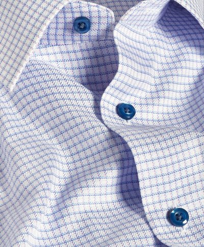 Close-up of the David Donahue OP Check Dress Shirt TBSP12821144, featuring a blue and purple checkered pattern and blue buttons—an elegant update from David Donahue to the classic stripe dress shirt.