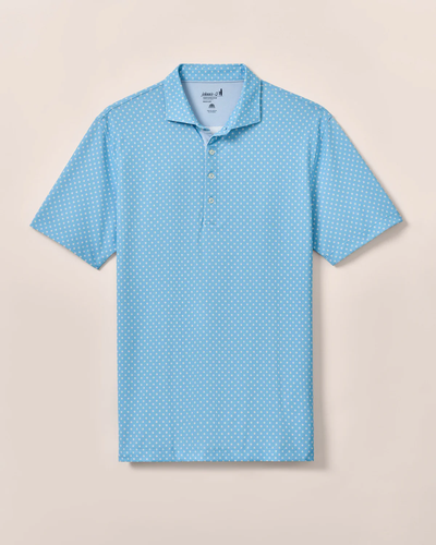 The Johnnie-O Daisy Performance Short Sleeve Polo features a light blue color with a white polka dot pattern, button-up collar, and moisture-wicking fabric for stylish comfort on any occasion.