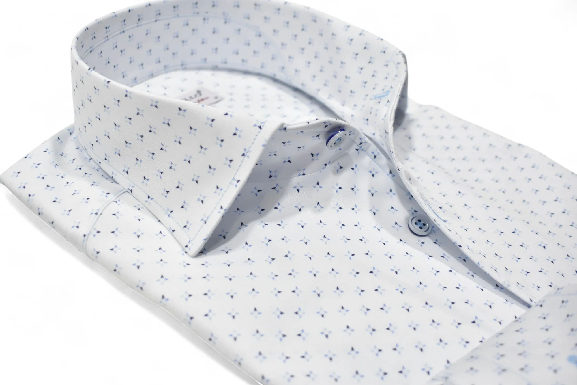 The Marcello OP Star Medallion Sport Shirt W114 by Marcello is a classic fit white cotton sateen shirt, detailed with a small blue geometric pattern and blue buttons, shown neatly folded on a plain white background.