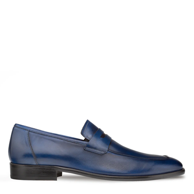 The Mezlan Calfskin Penny Loafer E20243 by Mezlan is shown in profile against a white background, featuring premium blue calfskin leather, a low black heel, and the classic penny slot detail.