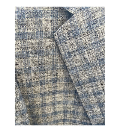 Close-up of the blue and gray plaid fabric on the MaxDavoli 252/1 Sport Coat by Baroni, highlighting the texture and overlapping lapel.