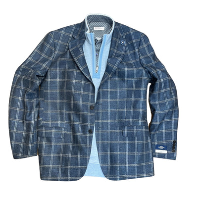 The Hart Schaffner Marx Sport Coat 24H0081, featuring a tailored silhouette, is layered over a light blue quarter-zip sweater and displayed flat on a white background.