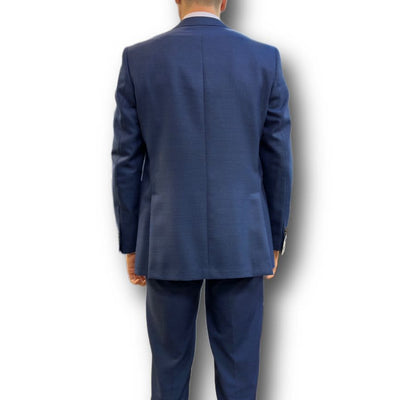 A man stands with his back to the camera against a plain white background, showcasing the refined silhouette of the Jack Victor Sport Coat 161150 Big and Tall, a tailored fit 100% wool sport coat by Jack Victor.