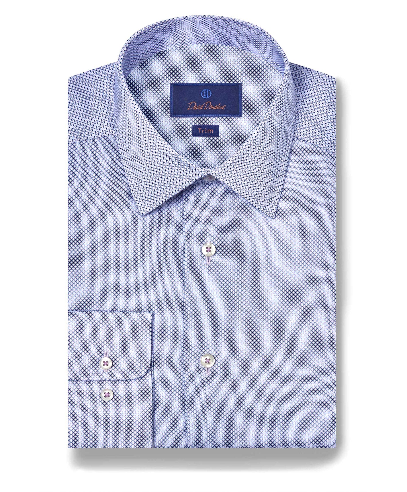 The David Donahue Medallion Prt Shirt TBSP11009 is a light blue, trim fit dress shirt with a micro geometric print, buttoned collar, single button cuff, and crafted from soft Pima cotton.