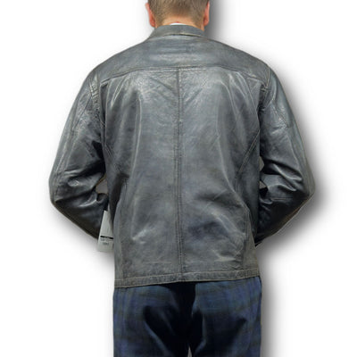 A person is shown from the back wearing the Missani Vintage Leather Jacket 392794 in dark grey with blue plaid pants, set against a plain white background.