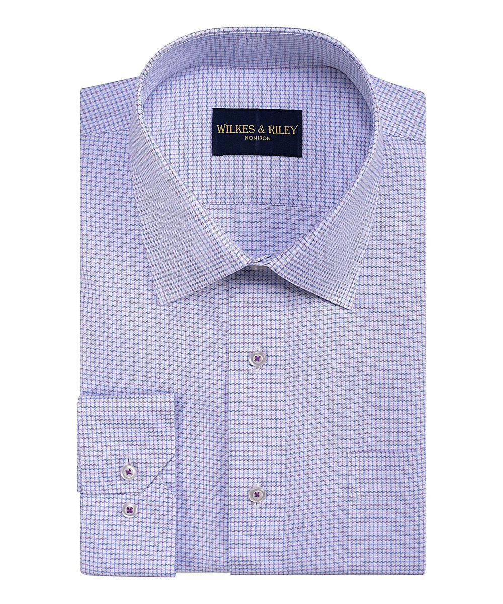 A folded Wilkes & Riley Rasp/Sky Check F5810 long-sleeve Supima cotton dress shirt features a small purple and white check pattern, spread collar, button cuffs, and a Wilkes & Riley Non-Iron label inside the collar.