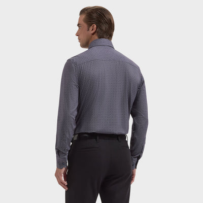 A man stands with his back to the camera, wearing the Bugatchi Devon Medallion Sport Shirt (KF9433K80) and black pants against a plain white background.