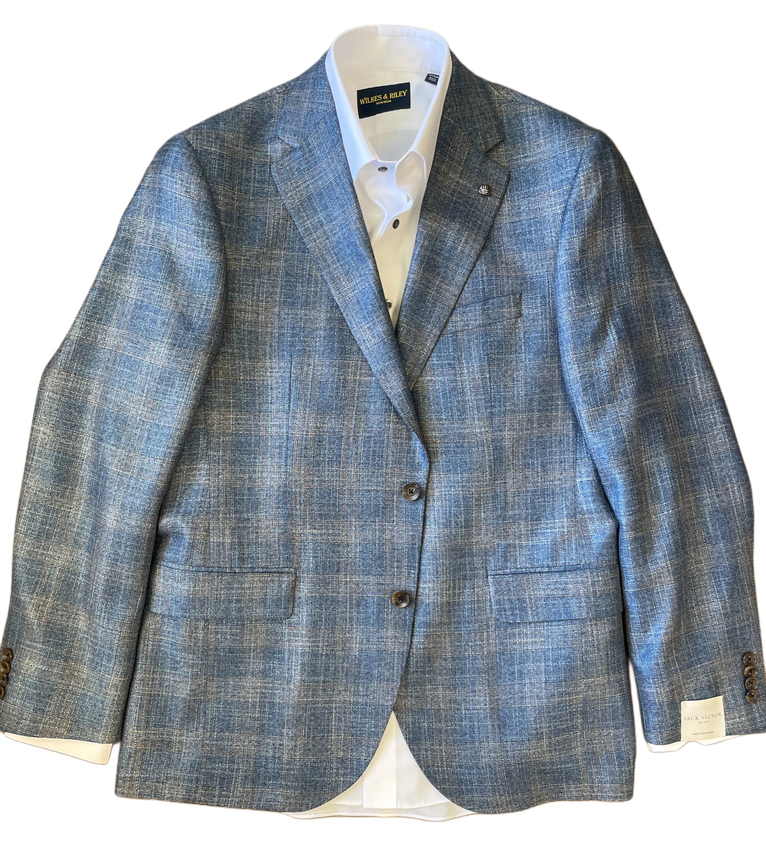 The Jack Victor Sport Coat 1261310 by Jack Victor, featuring a blue windowpane pattern and notch lapels, is paired with a white dress shirt and displayed flat.